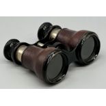 A PAIR OF LEATHER BOUND STATIC OPERA GLASSES WITH FOCUS ADJUSTMENT ,A/F