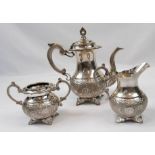 A Beautiful Antique Etruscan Style Tea Set. Embossed floral decoration throughout with lidded hoop