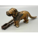 Two Vintage Iron Nutcrackers. A dog and a set of old school paddle crushers! Dog -23cm. A/F