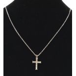 AN 18K WHITE GOLD DIAMOND SET CROSS ON A 42cms 18K GOLD CHAIN. 4.9gms