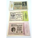 Three 1922/23 German Reichsbanknotes in 10,000, 50,000, 100,000 denominations.