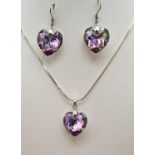 A SILVERCRYSTAL HEART DROP EARRINGS AND NECKLACE SET. 12.7gms