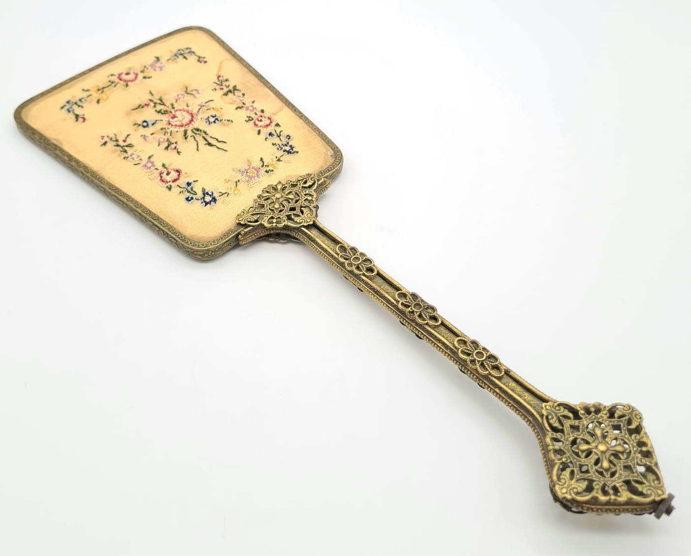 A Beautiful Vintage (1930s) Hand Mirror. Petit point rose decoration on reverse of mirror.