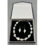 A statement necklace and earrings set, with huge baroque (up to 28 mm), natural pearls and cubic