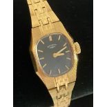 Vintage ladies ROTARY wristwatch in gold tone. Black face model. Manual winding.Full working