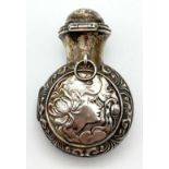 An Antique Victorian Silver Scent/Smelling Salts Bottle with Pendant Attachment. Embossed decoration