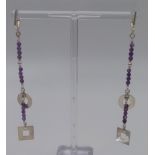 A PAIR OF SILVER AND AMETHYST DROP EARRINGS. 5.4gms