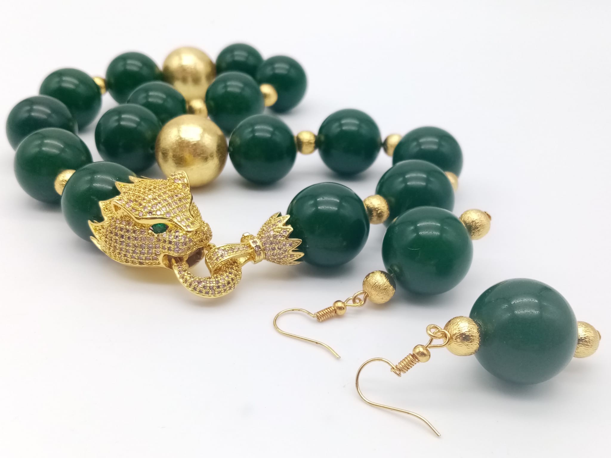 An impressive, Cartier style, dark green jade, large beaded (20 mm), necklace and earrings set, in a