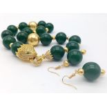 An impressive, Cartier style, dark green jade, large beaded (20 mm), necklace and earrings set, in a