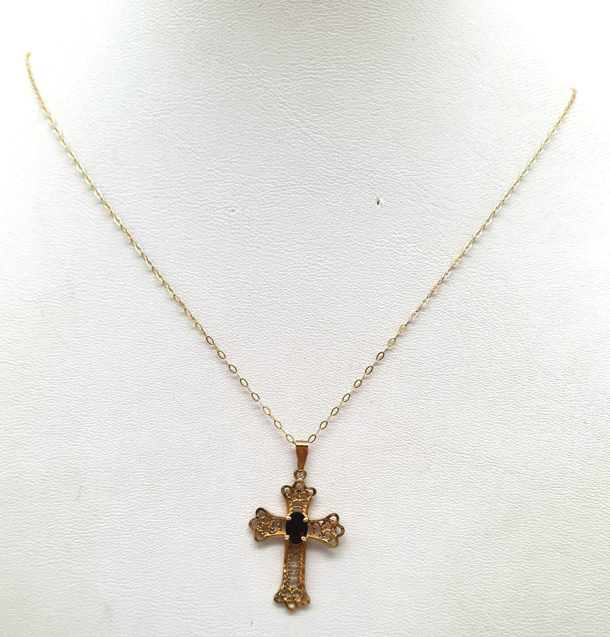 A 9K Yellow Gold Cross with Garnet Centre Stone on a 9K Yellow Gold Disappearing Necklace. 25mm - Image 3 of 7