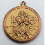 A 9K yellow Gold St. Christopher Pendant. 25mm. 6.92g.