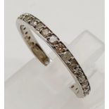 An 18K White Gold Diamond Eternity Ring. Size O. 1.91g total weight/