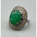 8.15cts Emerald Gemstone Ring in 925 Silver with a halo of two rows of diamonds ,1.20cts Diamonds in