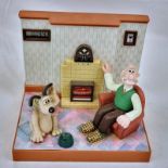 A Vintage Wallace and Gromit Clock and Radio Table Piece. Clock works but radio is temperamental