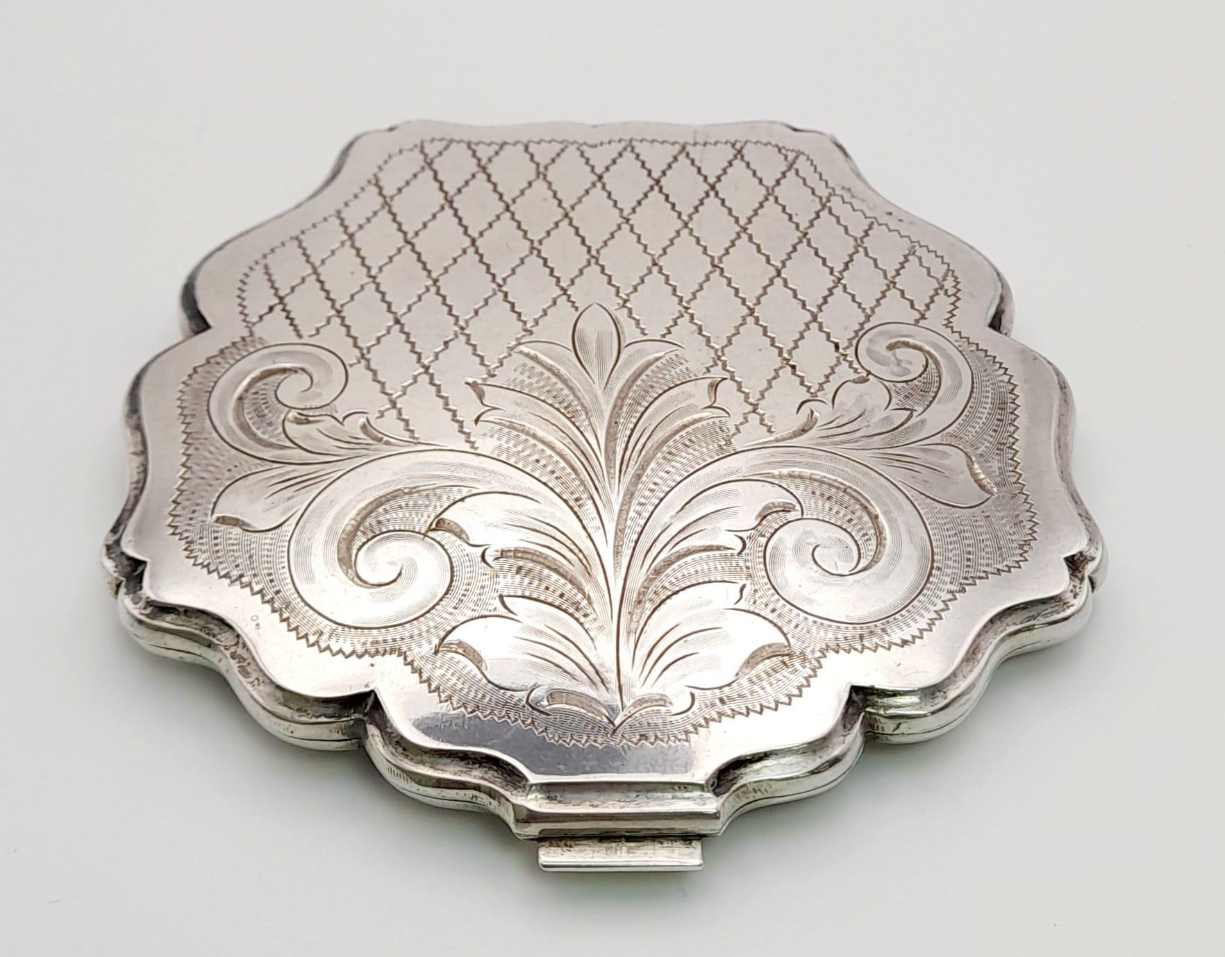 A Vintage Solid Silver Ladies Compact Clam. Clasp slightly tight but still works well. 800 hallmark.