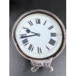 An Antique Solid Silver Travelling Clock. Hallmarks for London 1897. 7.5cm diameter. 185g total