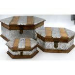 Three Tibetan silver and wood boxes. Dimensions of largest box: 28 x 19 x 11 cm. No damages.