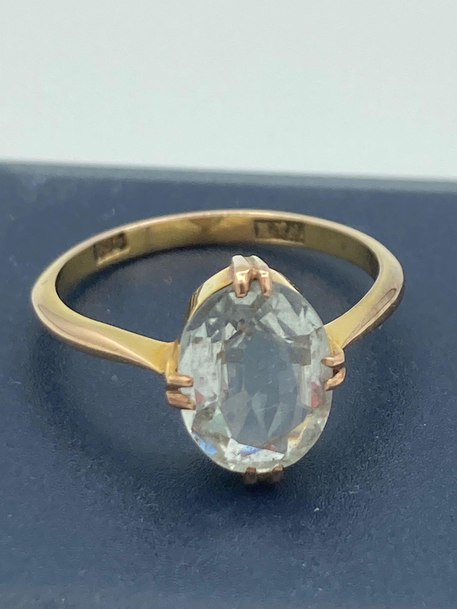 9 carat GOLD RING having AQUA solitaire mounted to top. 2.3 grams. Size M 1/2.