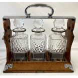 A VICTORIAN TRIPLE CUT GLASS DECANTER BY MAPLE AND CO , TOTTENHAM COURT ROAD, LONDON , WITH PATENT