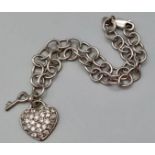 STERLING SILVER CZ SET HEART CHARM BRACELET. 7.8G. 18CM.