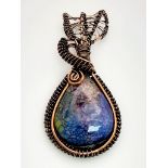 A Rainbow Solar Quartz on Copper Wire Pendant. 3.5 x 7cm.