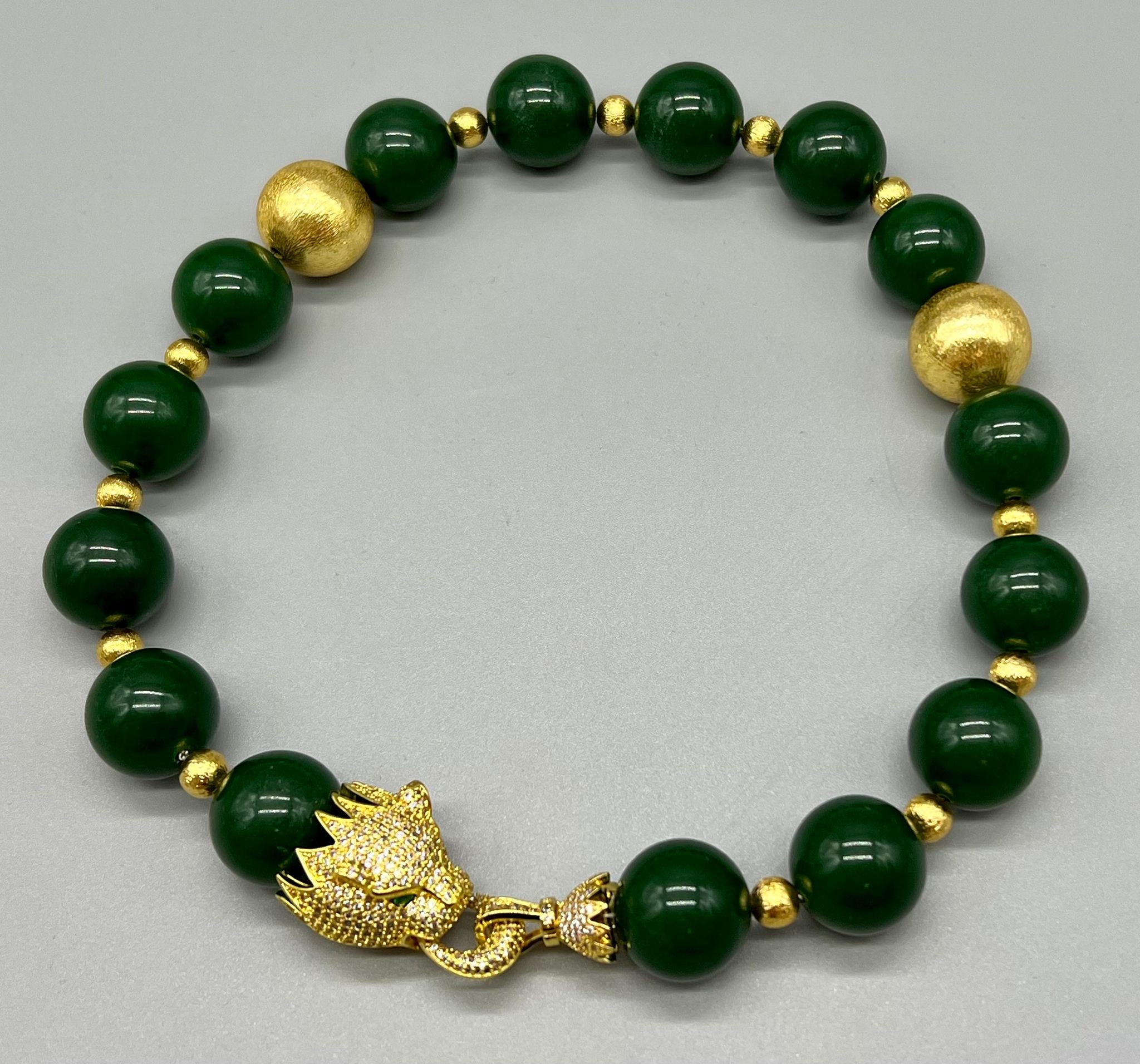 An impressive, Cartier style, dark green jade, large beaded (20 mm), necklace and earrings set, in a - Image 2 of 5