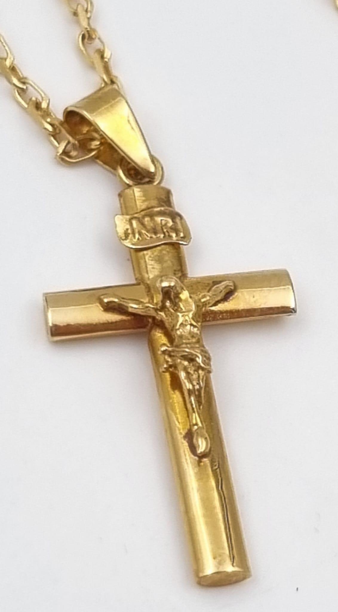 A 9K yellow Gold Crucifix on a 9K Yellow Gold Belcher Link Necklace. 25mm and 44cm. 3.33g. - Image 2 of 4