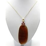 A Large Oval Agate Pendant on a Gilded Base and Necklace. 7cm and 44cm.