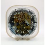 A Vintage German Wehrle See-Through Alarm Clock. 9.5 x 11cm. In working order but no guarantees.