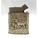 A large, sterling silver, table lighter, with pastoral scenes. Dimensions: 9.5 x 8 x 3 cm, weight: