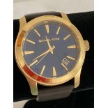 Genuine MICHAEL KORS WRISTWATCH,Having large blue oversized face with golden digits sweeping