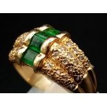 A FABULOUS 14K GOLD EMERALD AND DIAMOND RING. 9.62gms size O