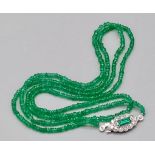 A Natural Emerald and Diamond Necklace. Small emerald beads with an emerald and 12 diamond clasp