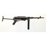 A SCHMEISSER MP40 .22 CALIBRE SEMI-AUTOMATIC RIFLE MADE BY GSG. SECTION 1 LICENSE REQUIRED. COMES