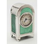 An Antique Solid Silver Enamel French Miniature Clock. Arch design with a green enamel front and