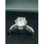STUNNING SILVER RING having large 1.5 carat Zirconia SOLITAIRE set to top in six claw mount,