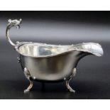 A Vintage Sterling Silver Gravy Boat. Serpent handle with three pedestal feet. Hallmarks for