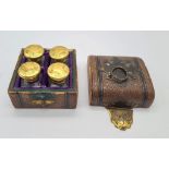 A VICTORIAN SET OF 4 GILT TOPPED PERFUME BOTTLES IN ORIGINALCARRYING BOX (BOX NEEDS HINGE ATTENTION)