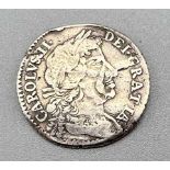 A Charles II 1679 Silver Shilling Coin. Please see photos for conditions.