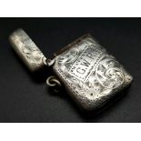 An Antique Silver Vesta Case. Hallmarks for Birmingham 1899. Makers mark of T.H. Hazelwood. 3 x 4cm