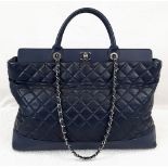 A Blue Chanel Grand XL Shopping Tote Bag. Quilted Caviar leather diamond design. Interwoven