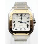 A CARTIER LARGE GENTS STAINLESS STEEL AND GOLD TANK STYLE AUTOMATIC WATCH IN ORIGINAL BOX AND WITH