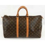 A Louis Vuitton Traditional Monogrammed Canvas Keepall Badouliere 45. In good condition but please