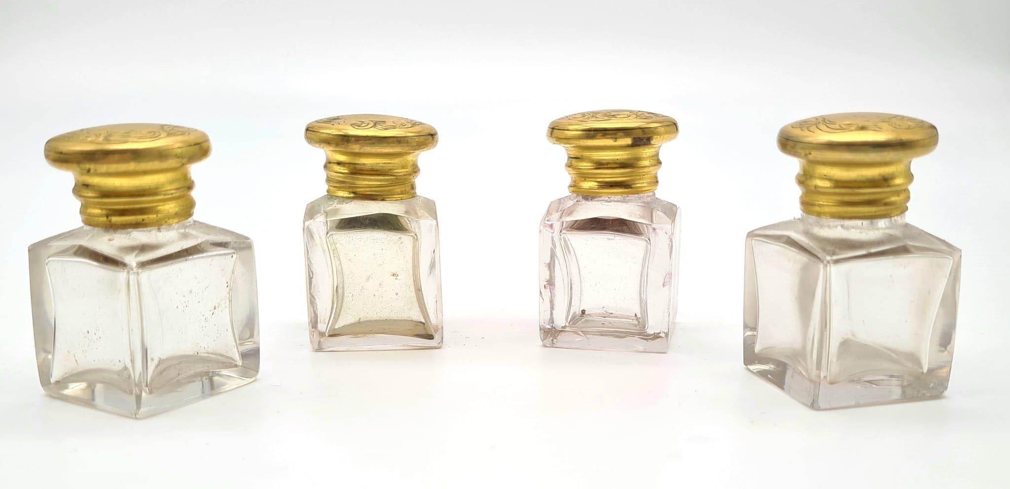 A VICTORIAN SET OF 4 GILT TOPPED PERFUME BOTTLES IN ORIGINALCARRYING BOX (BOX NEEDS HINGE ATTENTION) - Image 2 of 7