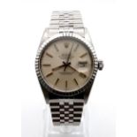 A gents, stainless steel ROLEX DATEJUST watch. 36 mm dial, champagne face with gold hands and hour