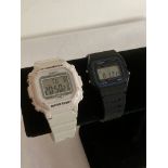 2 x CASIO Digital wristwatches. One in black the other in white.Water resistant with screw backs and