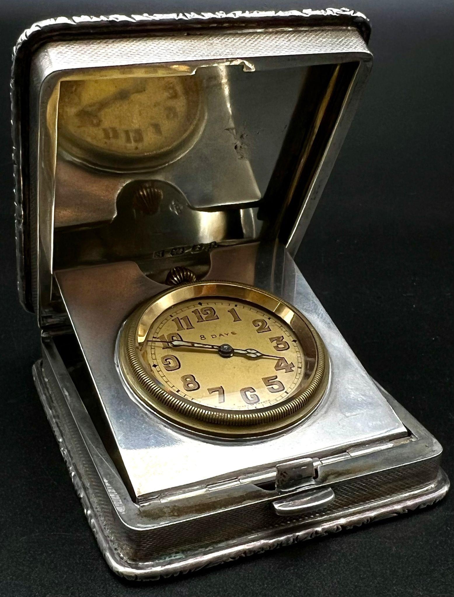 An Antique Solid Silver Engine Turned Travelling Clock. Hallmarks for Birmingham 1929. 6.5 x 7.