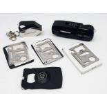 A Collection of Six Utility Tools Comprising of 3 Wallet Survival Tools, One Compass and Magnifier