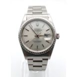 A ROLEX STAINLESS STEEL OYSTER PERPETUAL DATEJUST WUTH SILVERTONE DIAL. 36mm 9106