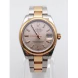 the mid size uni-sex rolex oyster perpetual datejust watch in bi-metal with pink dial. 31mm (9110)